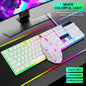 Ergonomic rainbow backlit USB gaming keyboard and mouse combo with multimedia keys and plug-and-play support on a desk.